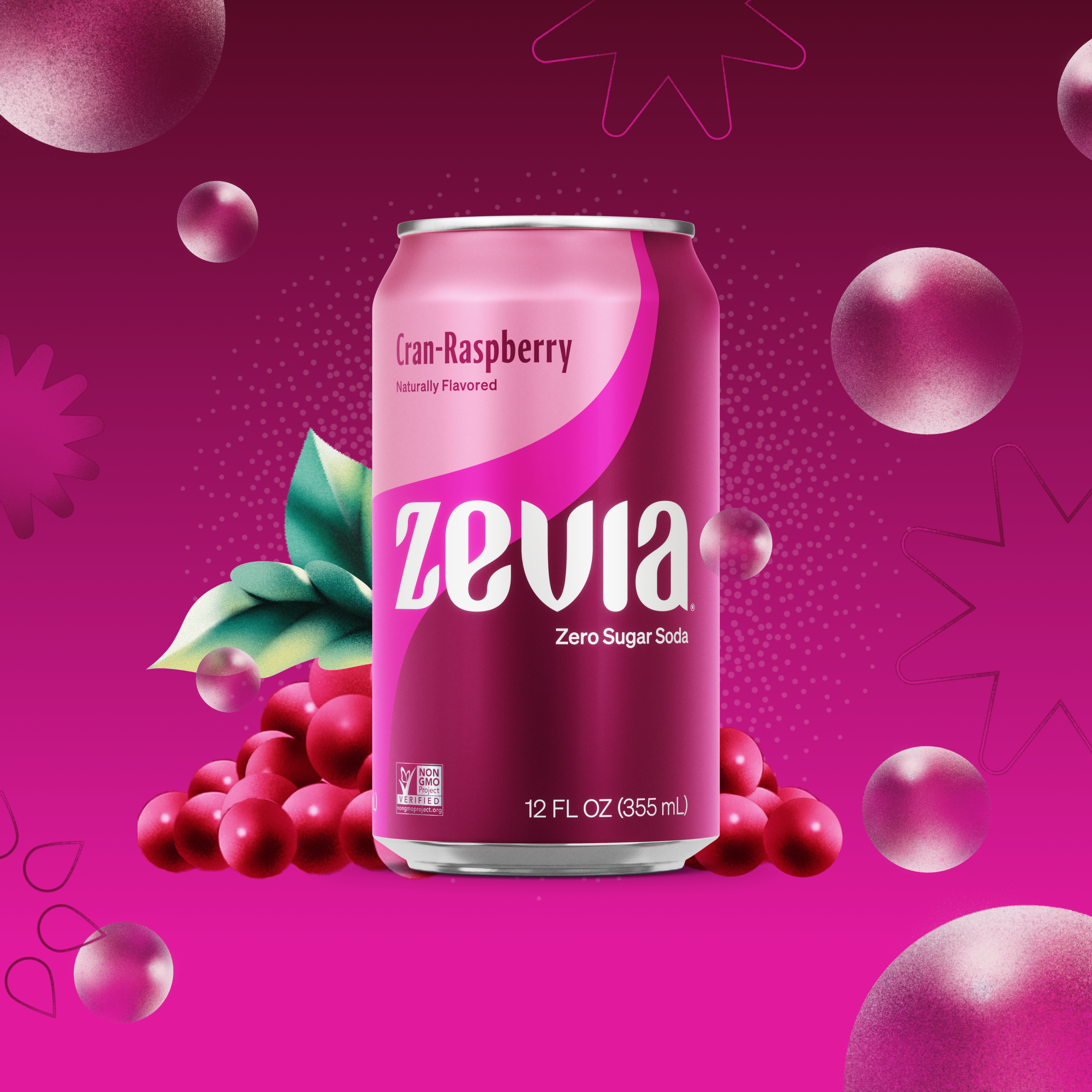 Zevia Cran-Raspberry soda can on a pink background with cranberries and raspberry leaves.